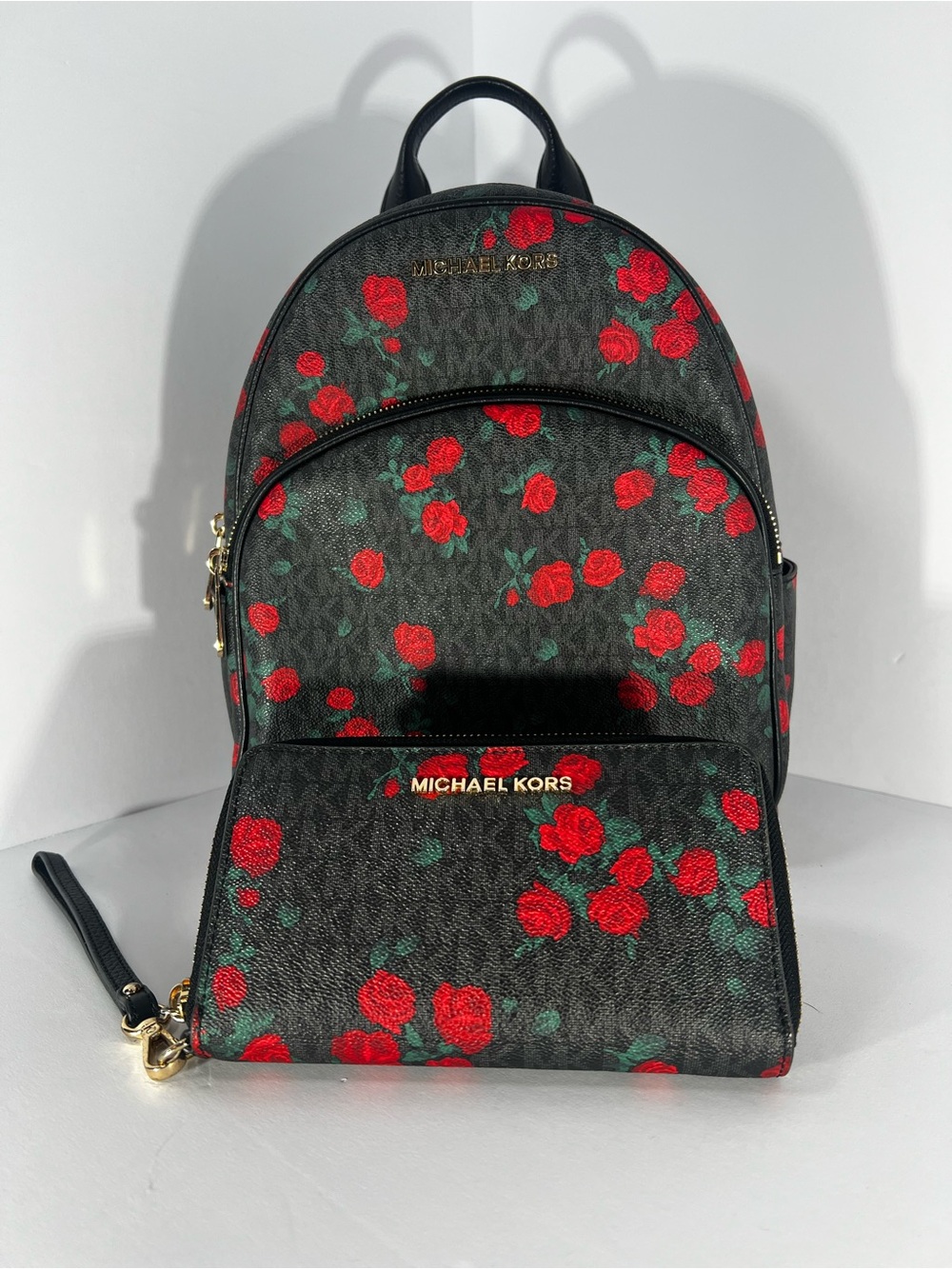Michael Kors Black Backpack and Wristlet with Red Rose Print